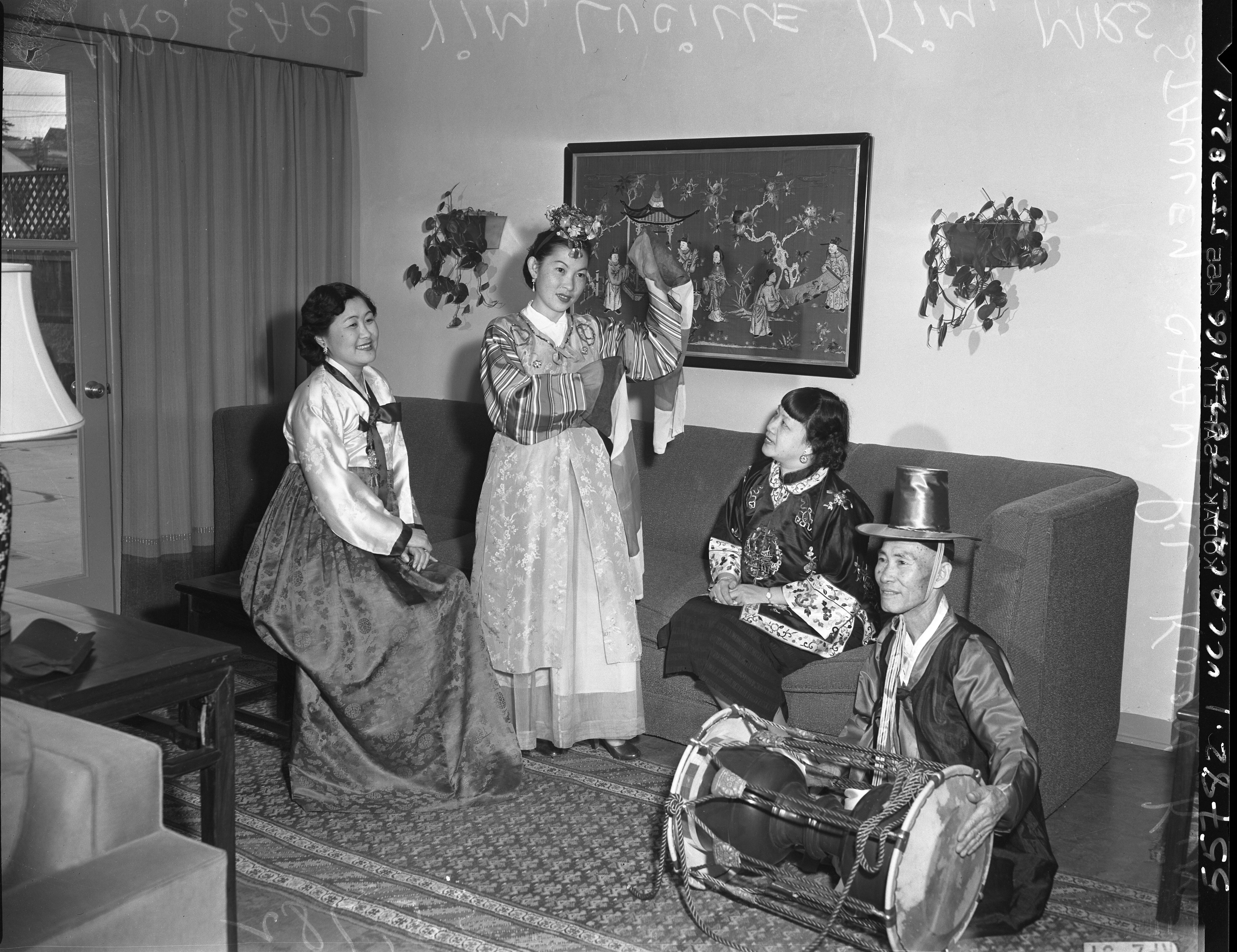 Korean American women's group members in traditional Korean clothes with Korean drummer Los Angeles, Calif., circa 1952